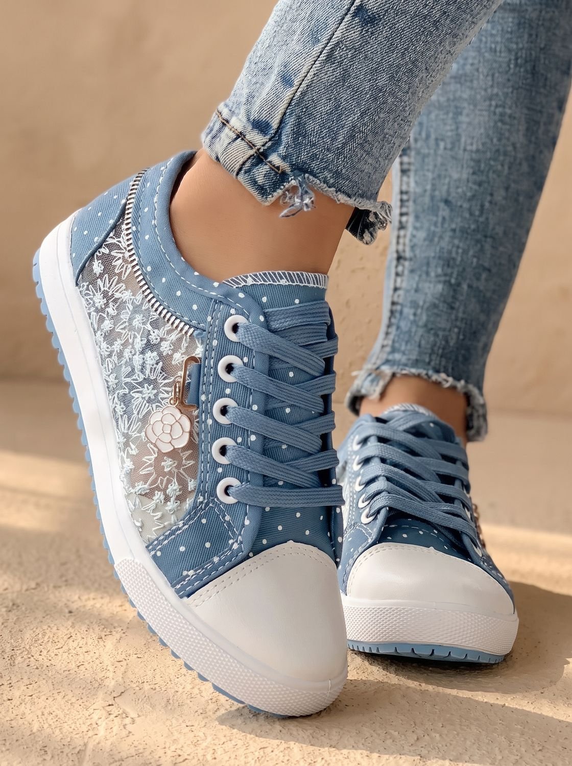 Close-up of the breathable floral mesh sneaker upper