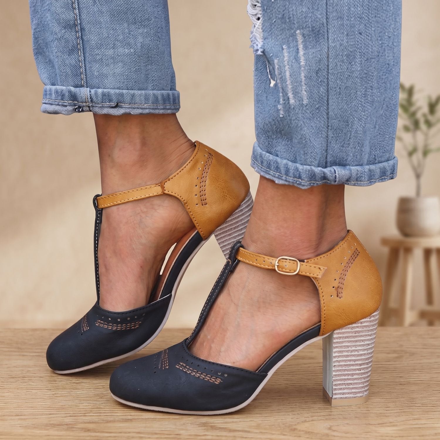 Side view of women's Mary Jane block heel pumps
