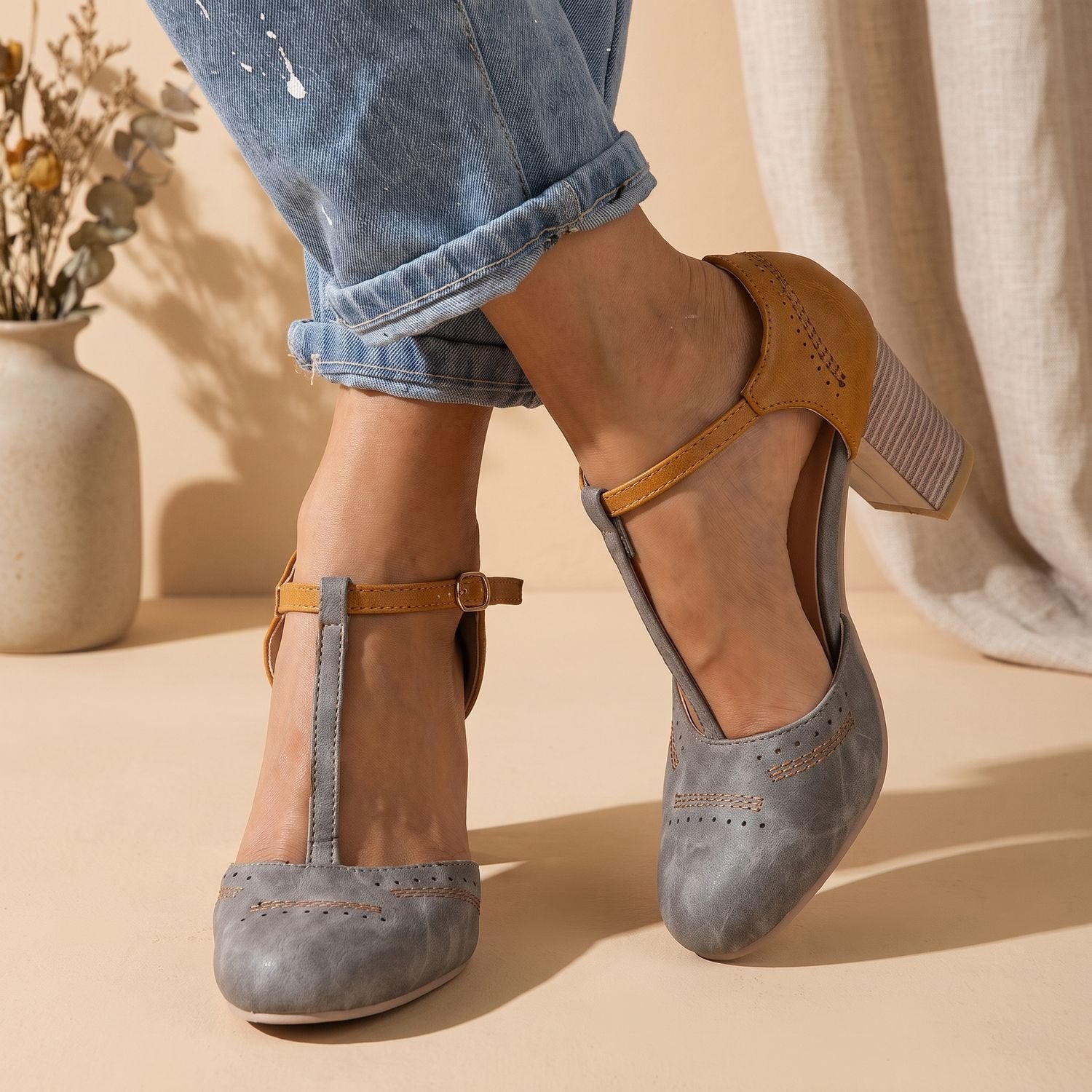 Women's pumps showing the supportive block heel