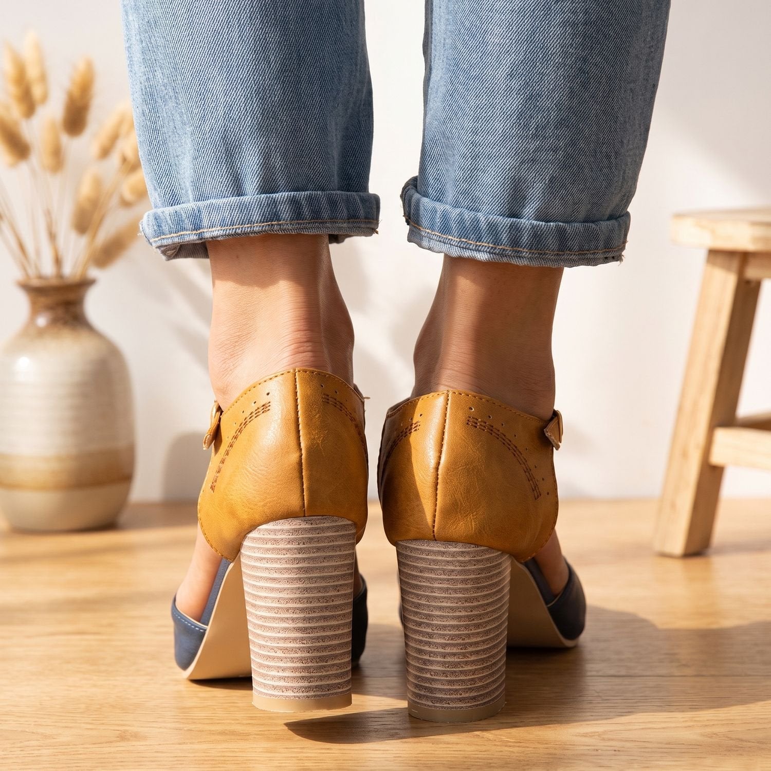 Angled view of women's block heel pumps