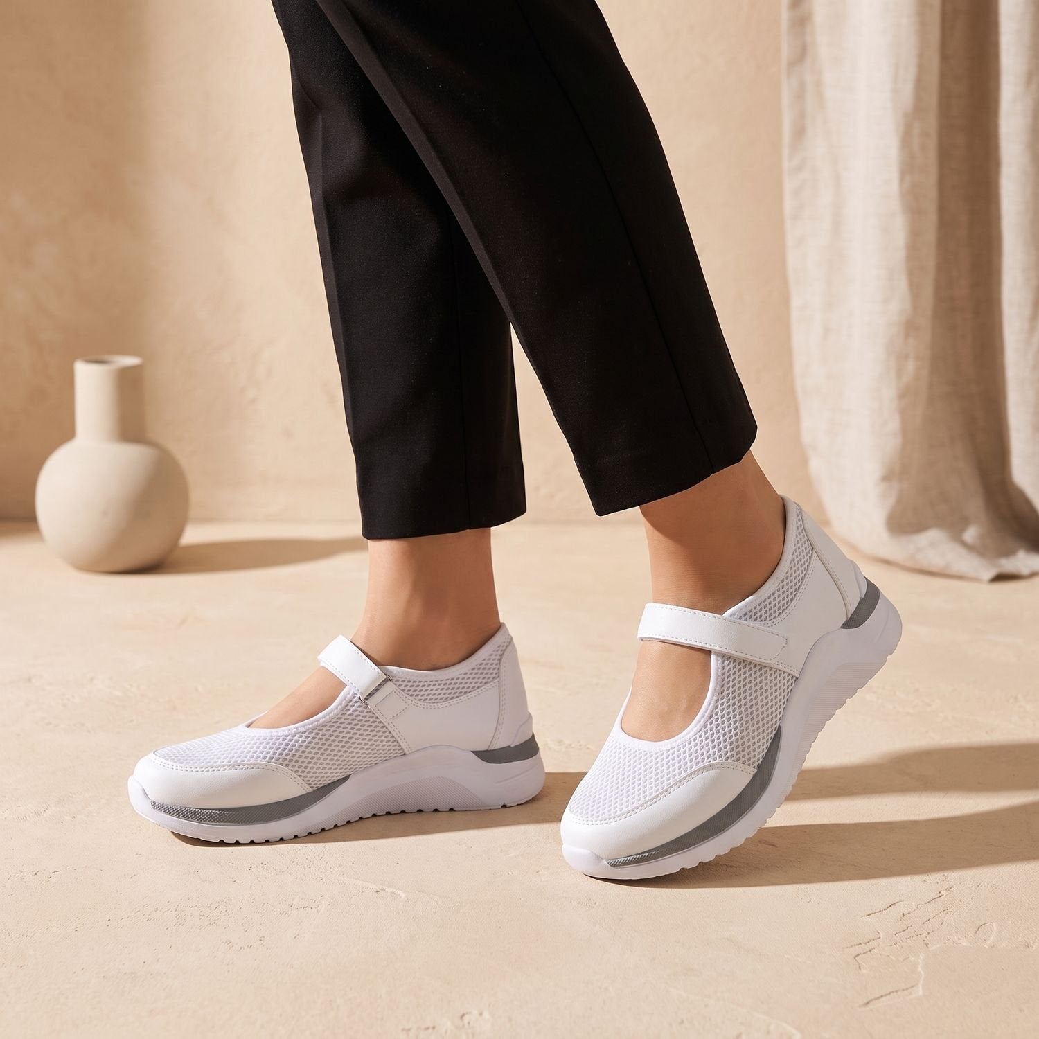 Close-up of the breathable mesh upper on a women's Mary Jane sneaker