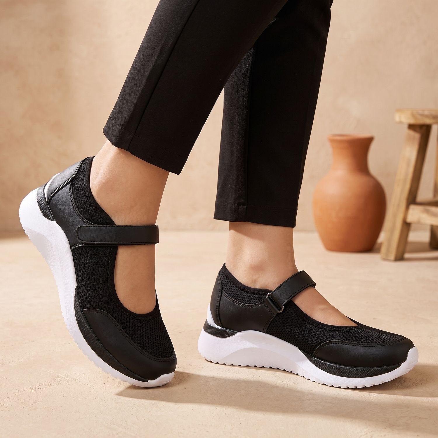 Back view of a women's orthopedic Mary Jane sneaker