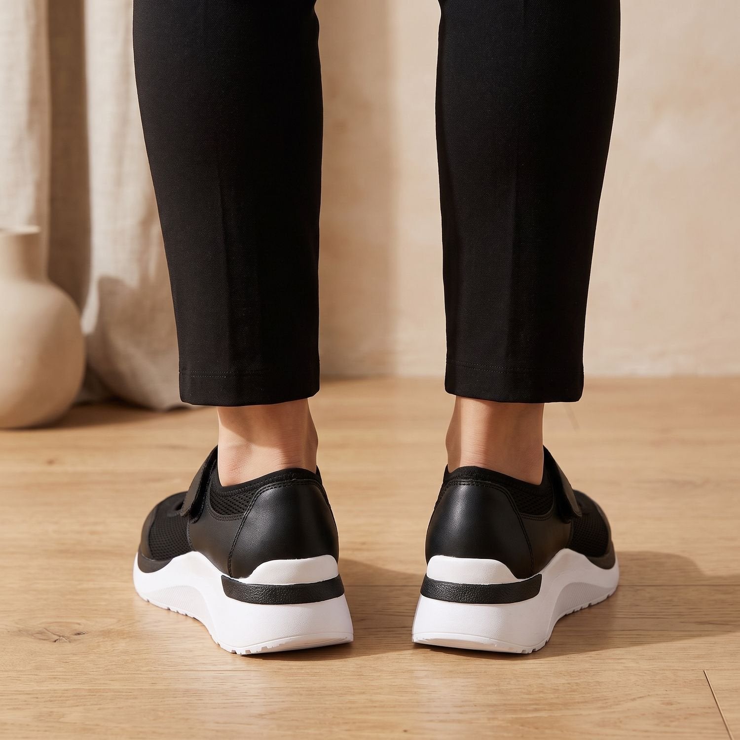 Pair of women's orthopedic Mary Jane sneakers with Velcro straps
