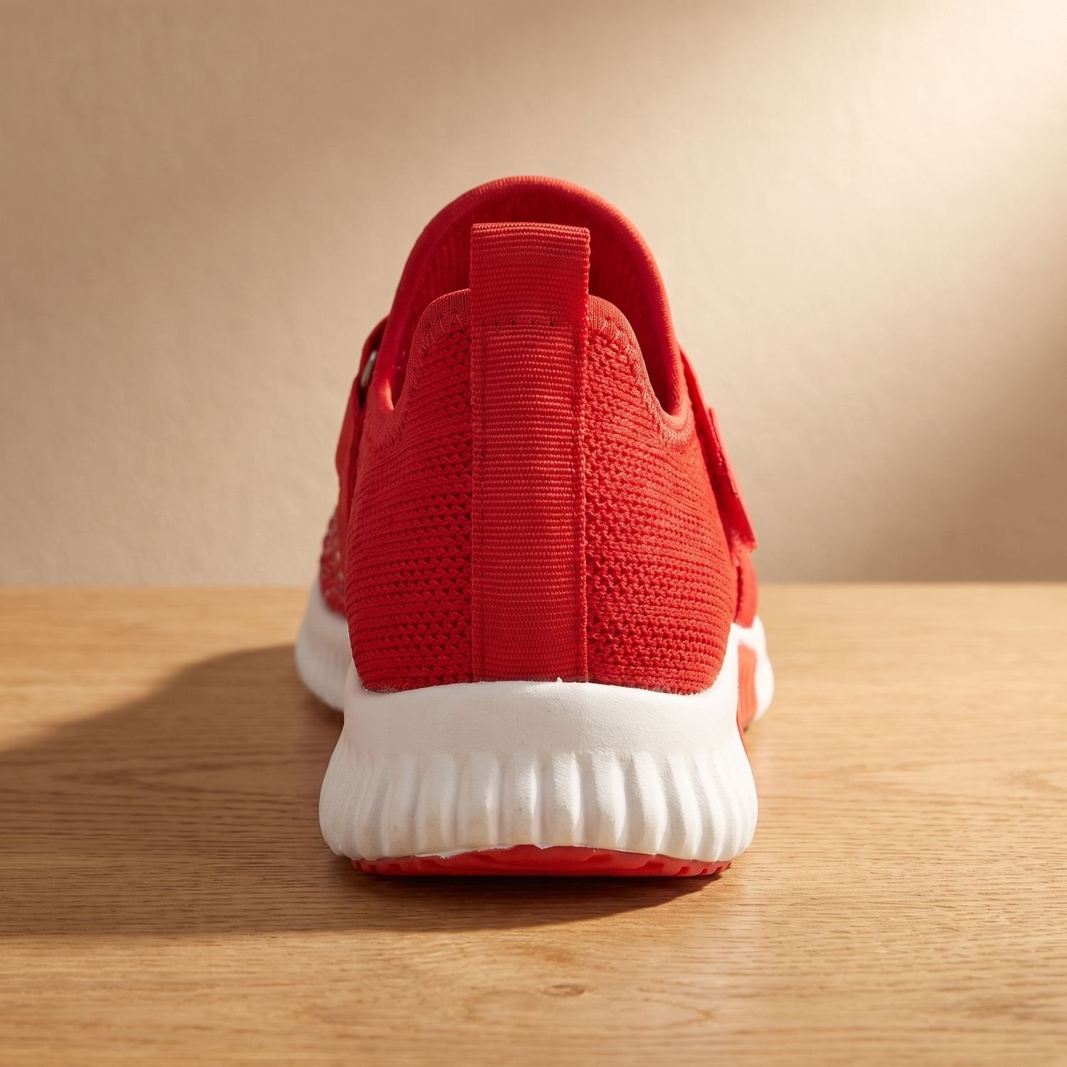 Women's orthopedic slip-on knit sneaker shown from the side