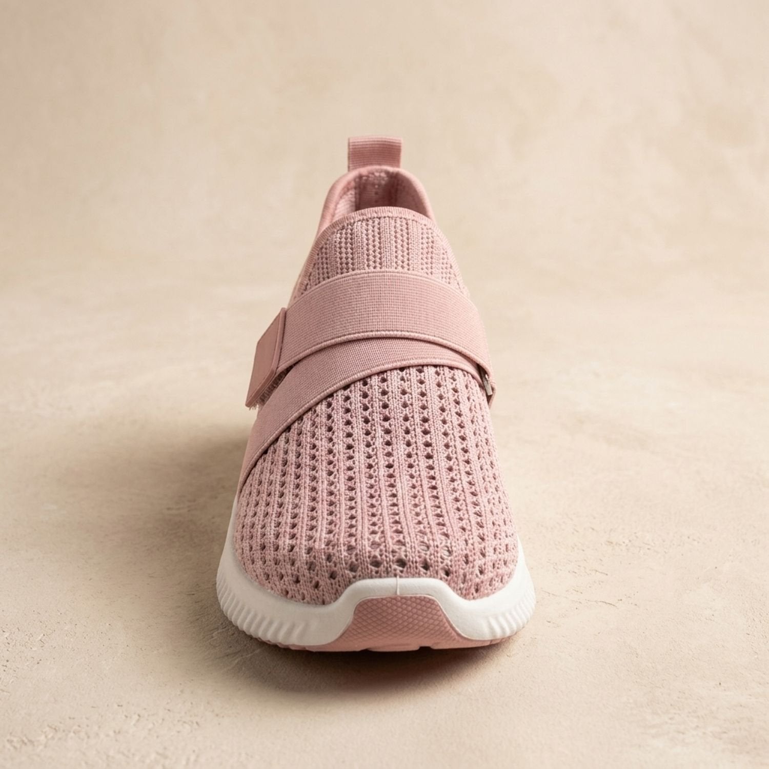 Women's sneaker showing the cushioned orthopedic sole