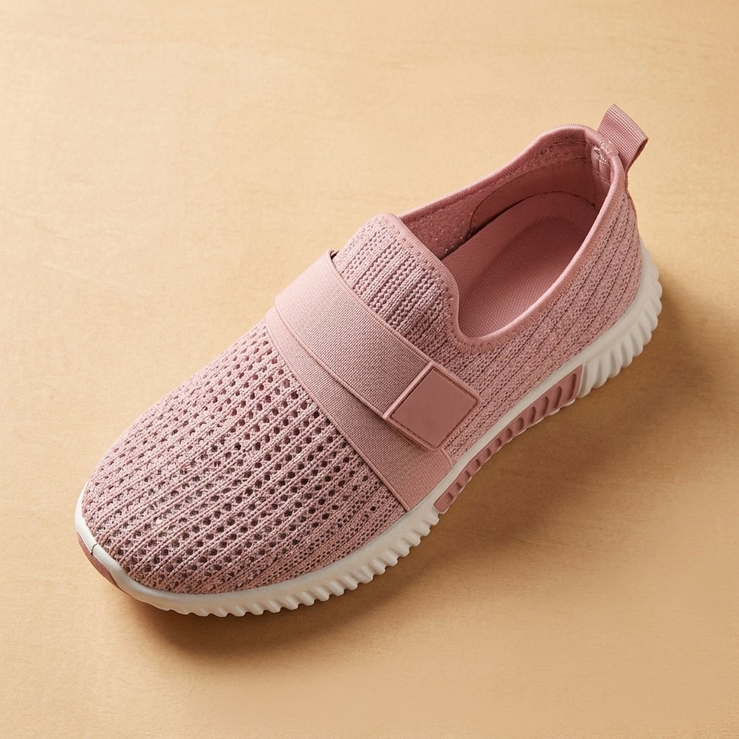 Front view of a women's orthopedic slip-on knit sneaker