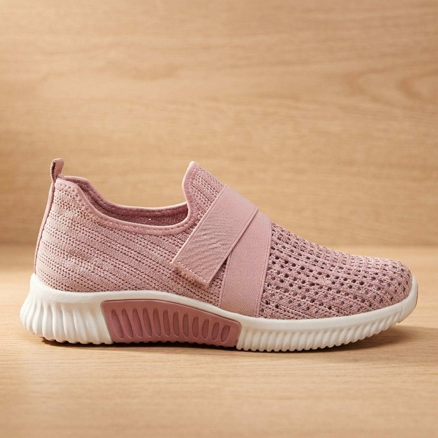 Back view of a women's knit sneaker with a supportive heel