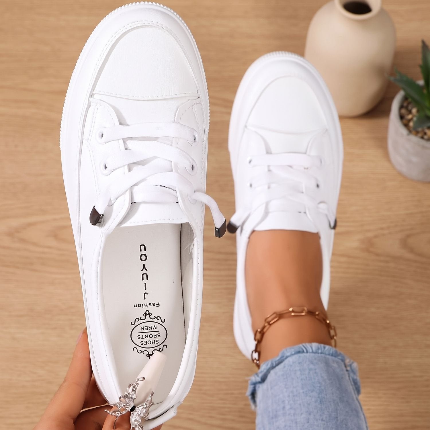 Pair of women's orthopedic sneakers displayed together