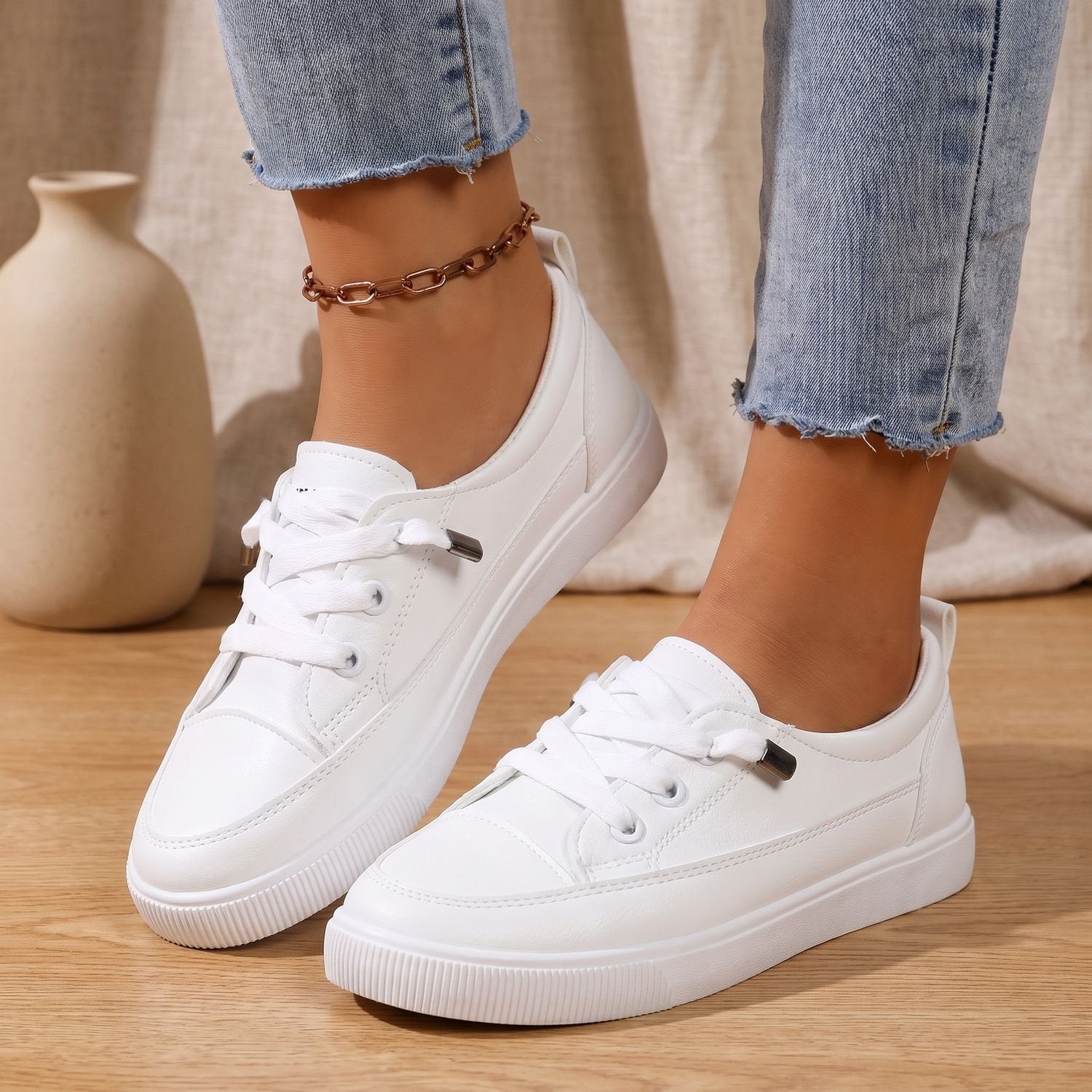 Close-up of the lace-up front on women's arch support sneakers