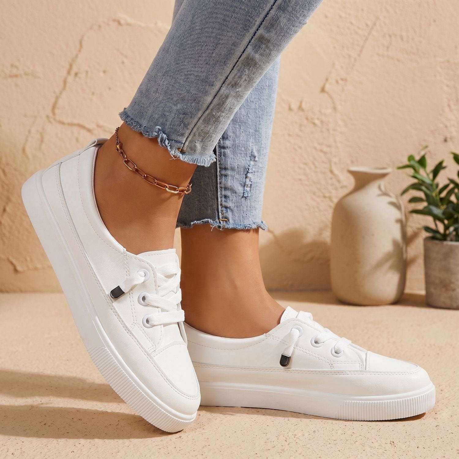Women's arch support lace-up sneakers shown from the side