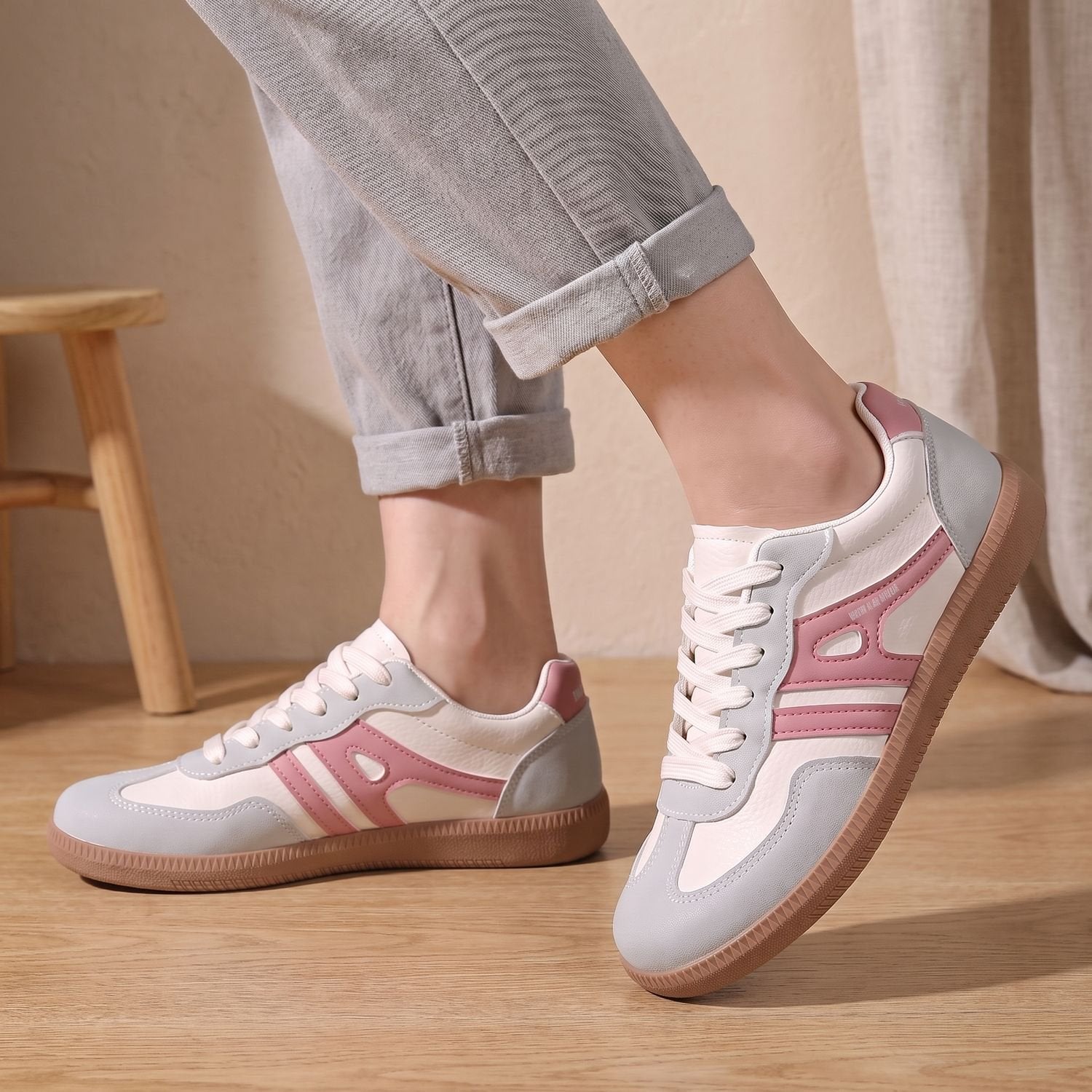 Women's height-boosting lace-up sneakers shown from the side