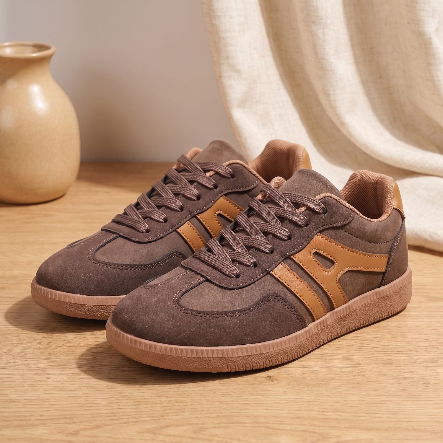 Women's retro court sneakers with lace-up closure shown at an angle