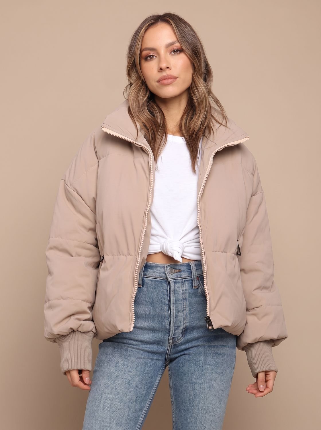Women's oversized puffer jacket featuring a high stand collar