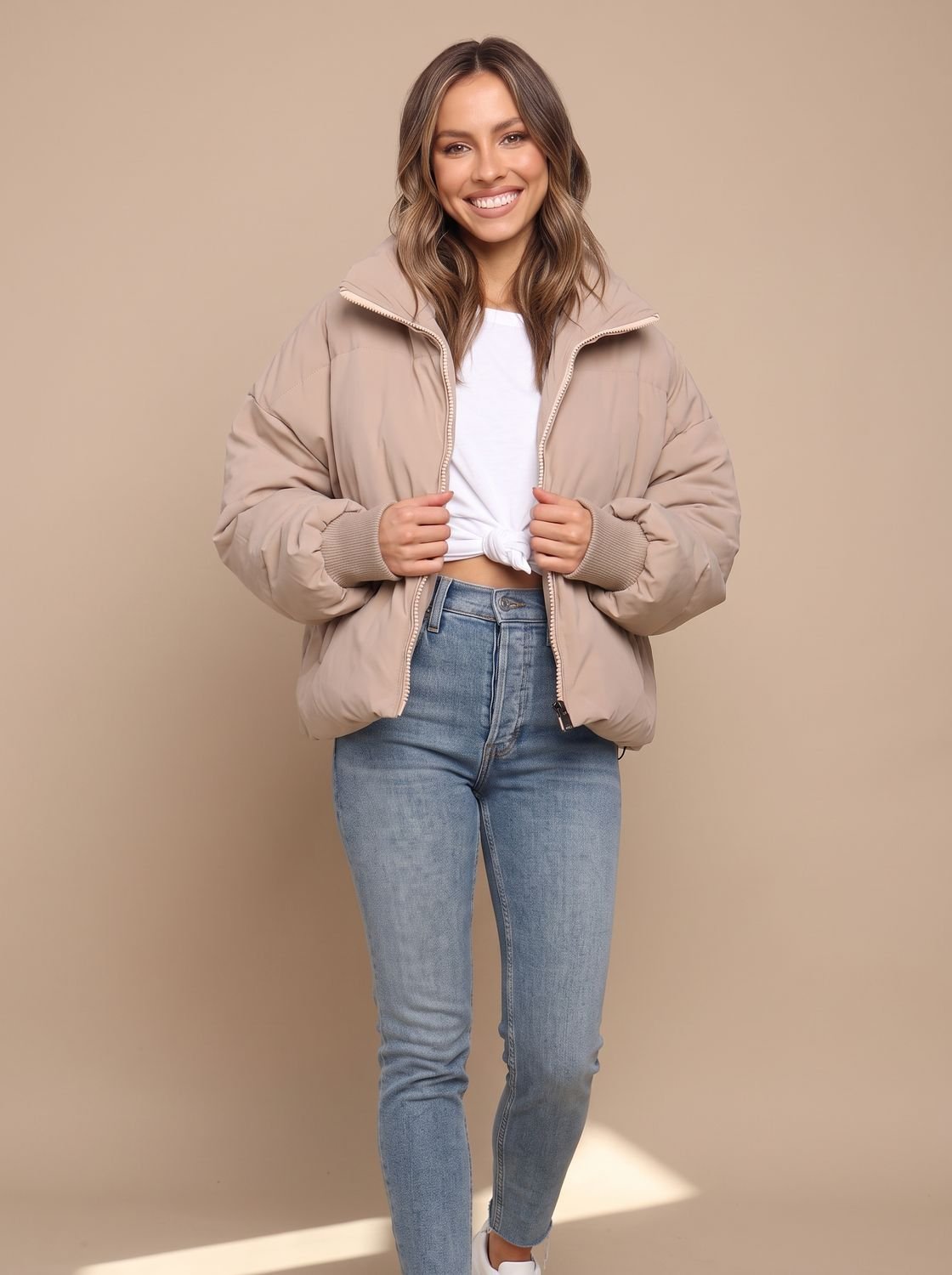 Women's oversized puffer jacket styled for cold-weather layering