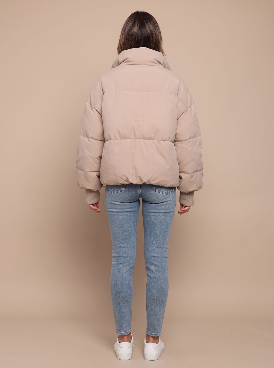 Full view of the women's puffer jacket with long sleeves
