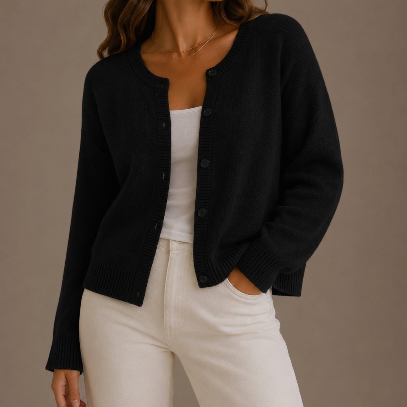 Women's knit cardigan with button-up front and round neckline