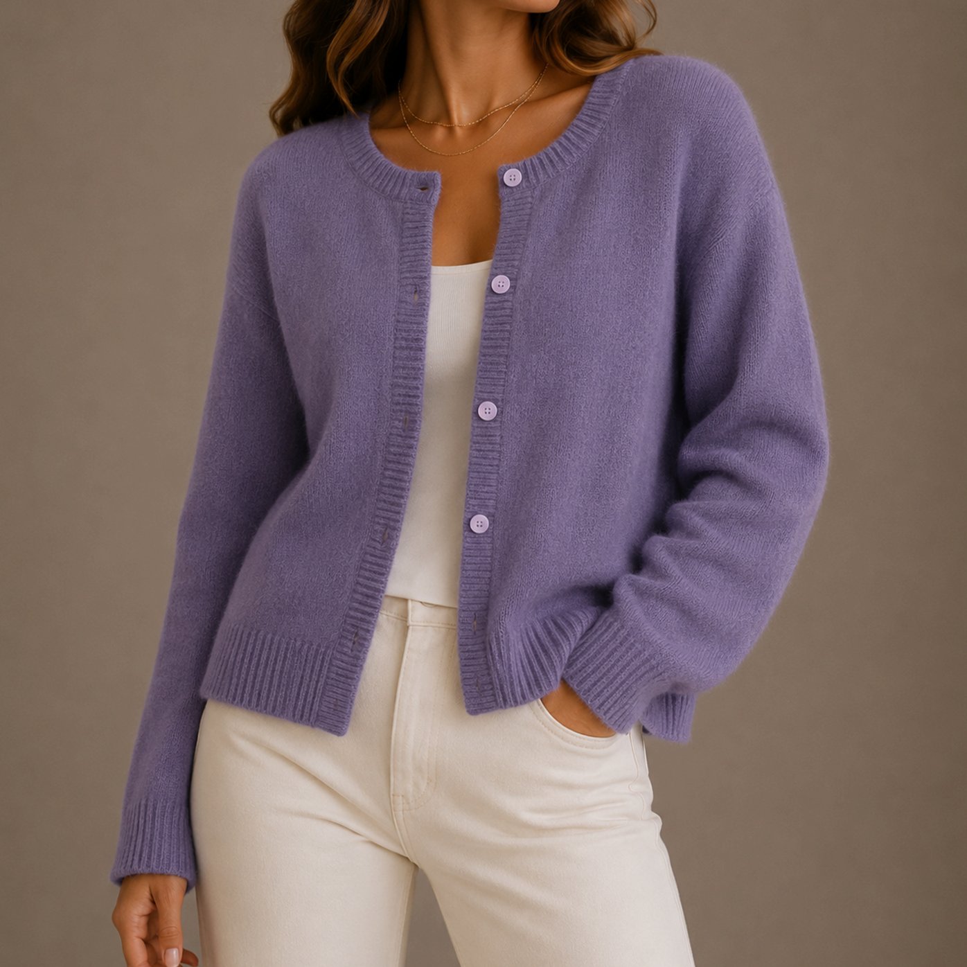 Close-up of the button-up front on a women's knit cardigan