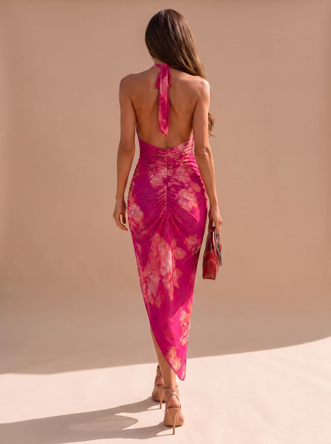 Front view of a women's ruched cowl-neck midi dress
