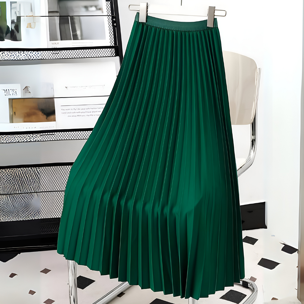 Flowing pleated silhouette of a high-waisted midi skirt