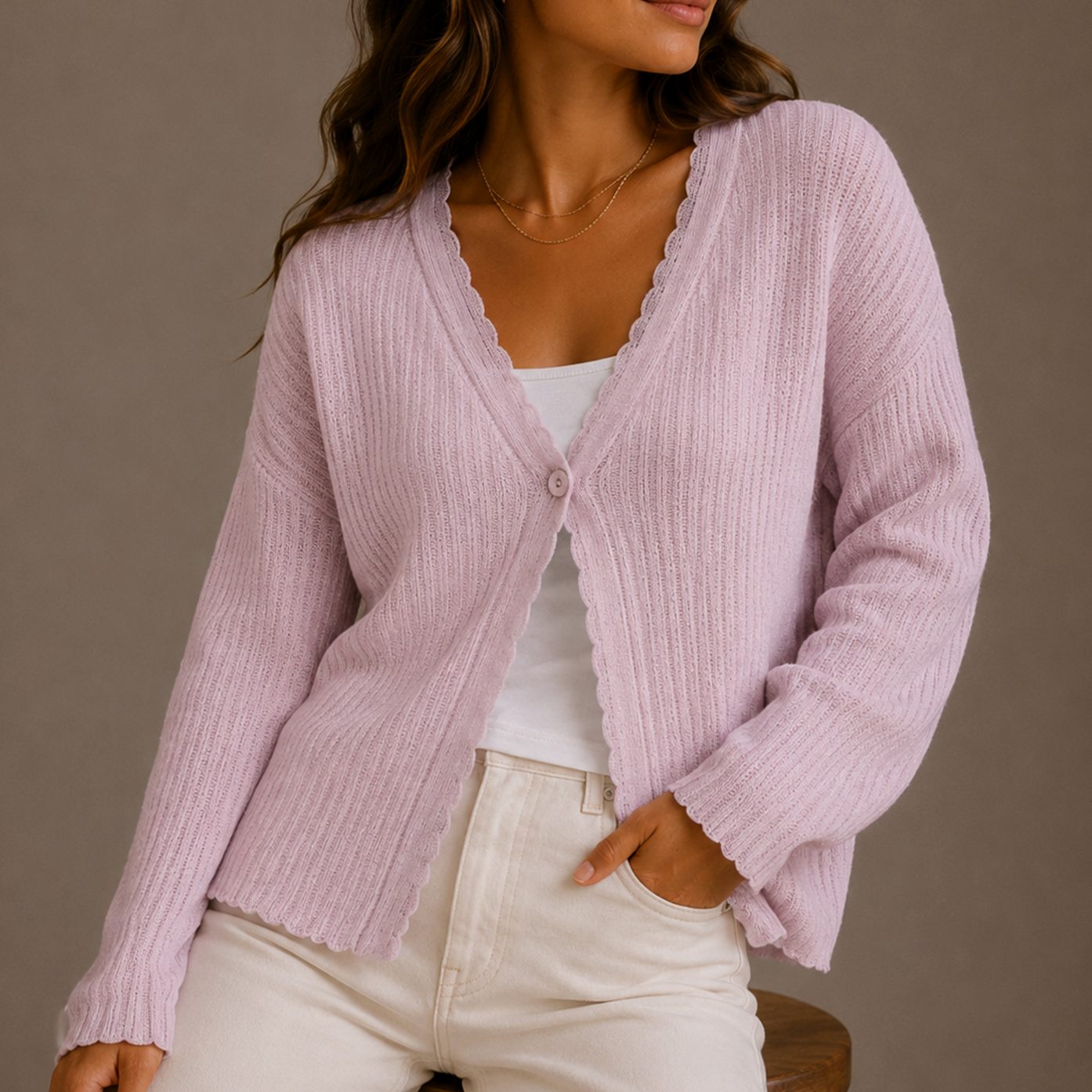 Side view of the scallop-trim V-neck cardigan