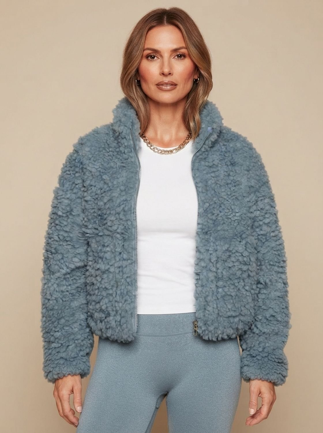 Women's sherpa fleece jacket with a full zip front and stand collar