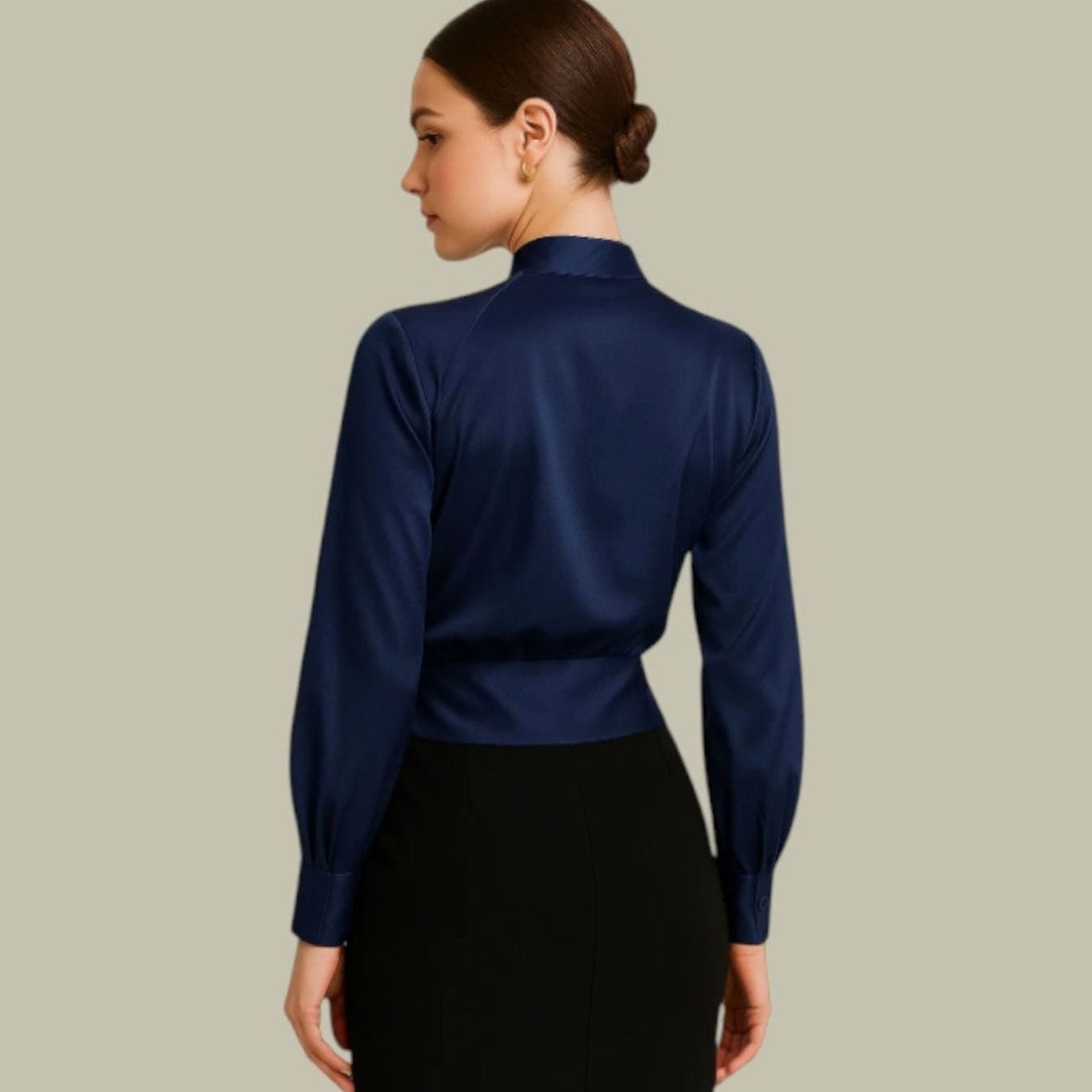 Front view of a women's satin blouse featuring a stylish wrap design
