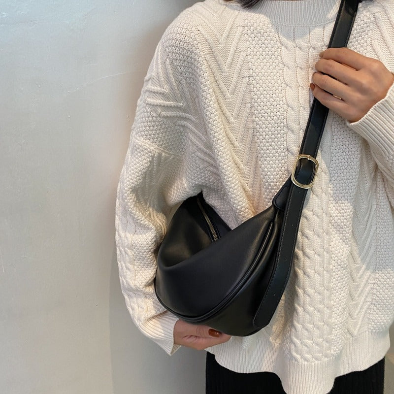 The It-Girls Are Trading Their Minimalist Half Moon Bags For This